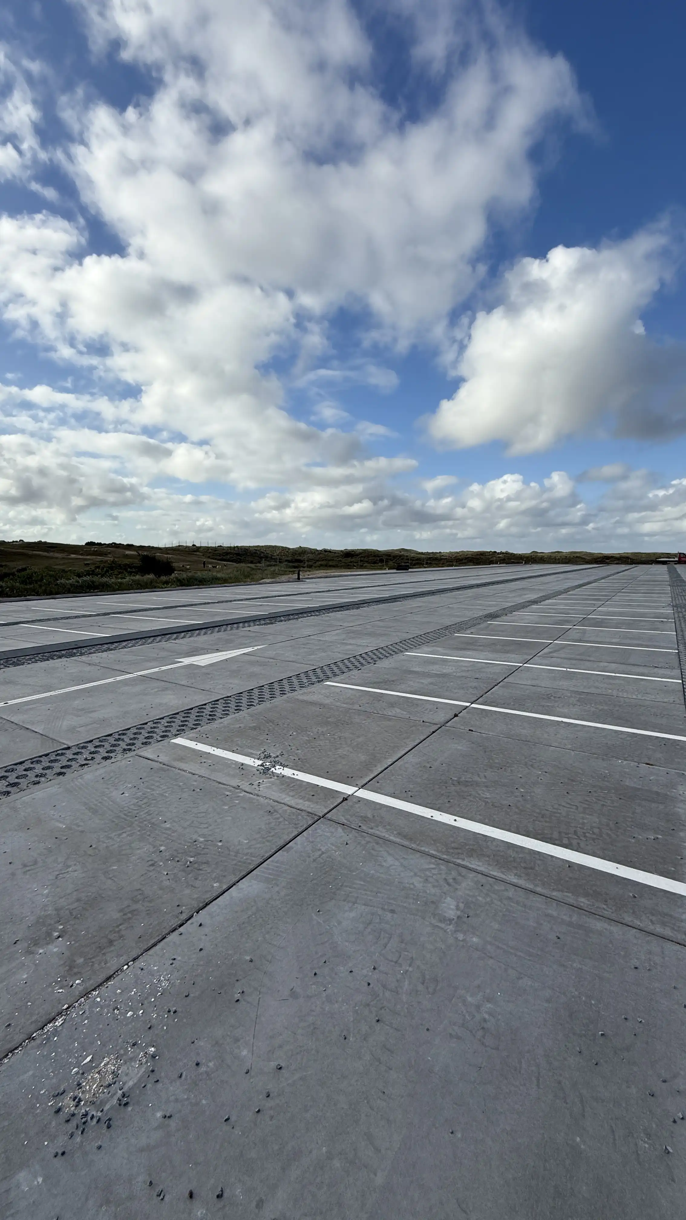 Large concrete slab construction with drainage channels